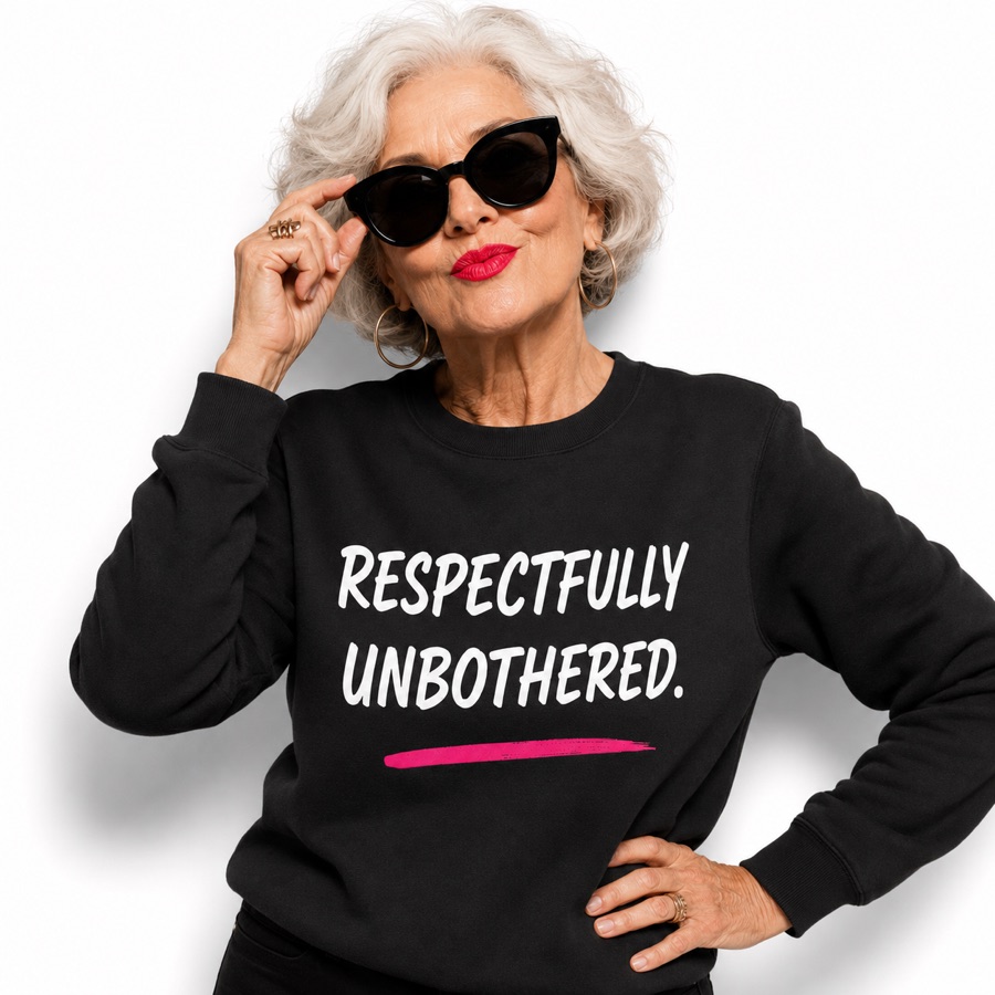 Silver-haired model wearing the Respectfully Unbothered sweatshirt.